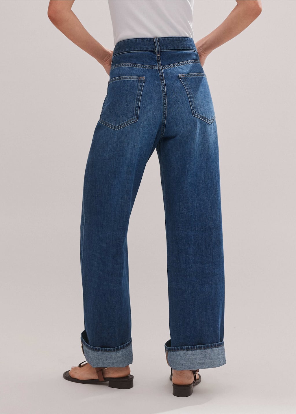 Crafted from pure-cotton denim in an authentic mid-blue wash detailed with subtle fading and whiskering.