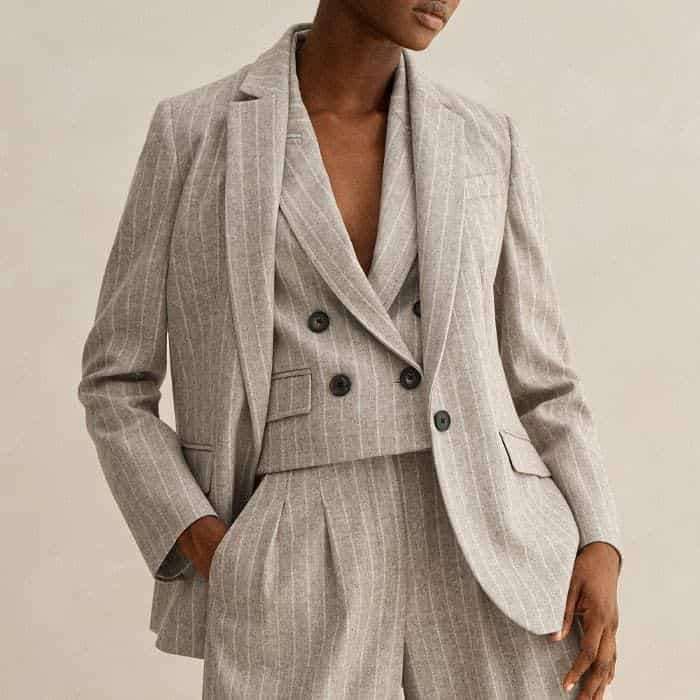 Build a three-piece suit with our Italian Melange Pinstripe Boyfriend Blazer and our Italian Melange Pinstripe Wide-Leg Trouser or Italian Melange Pinstripe Slim Crop Trouser. 