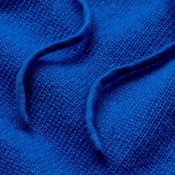 Crafted from luxurious cashmere with a supersoft handfeel and a looser tension for a natural drape. 