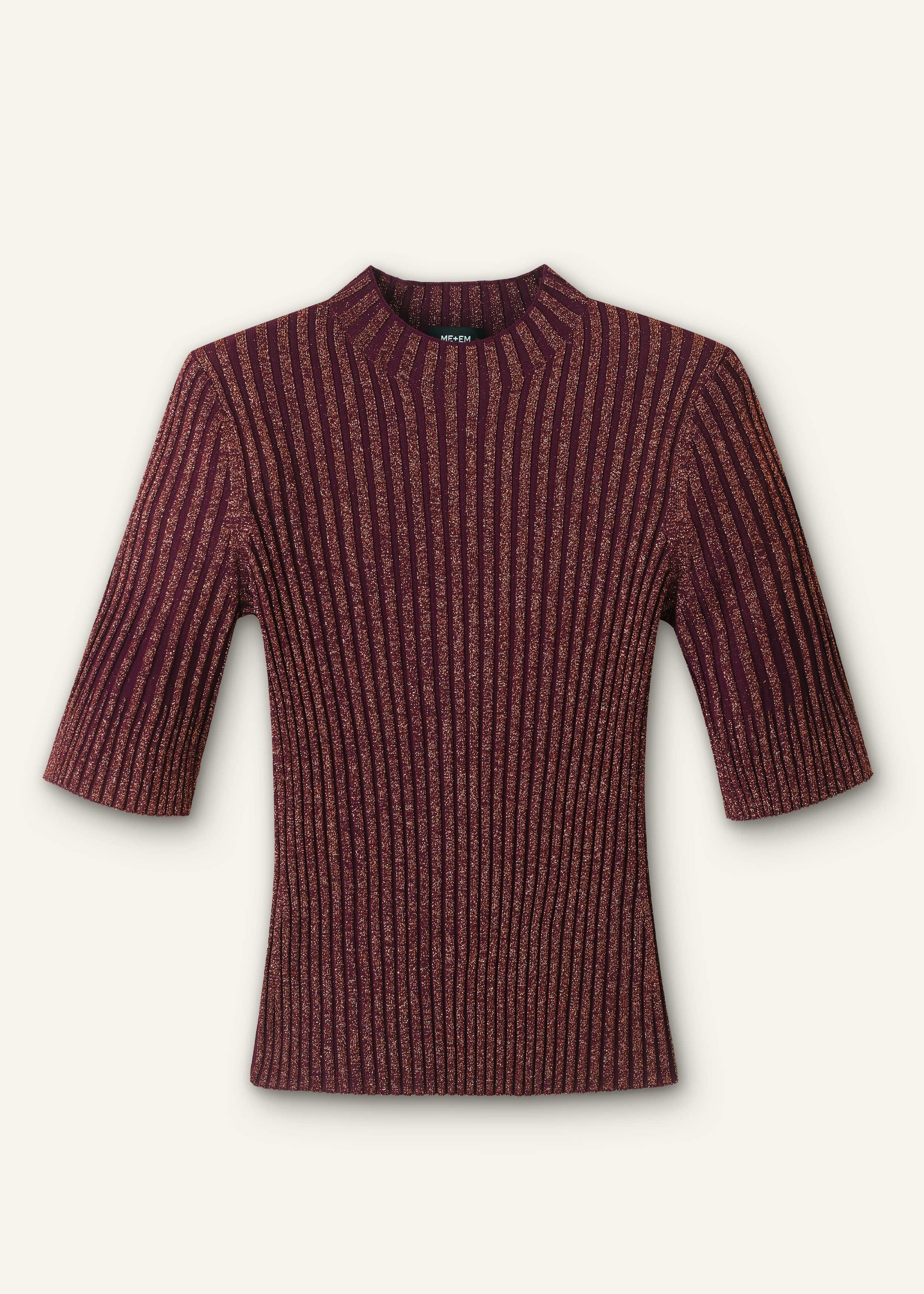 Crafted from a viscose stretch knit with sparkly metallic fibres throughout.