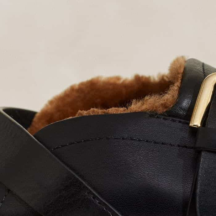 A shearling lining locks in warmth and creates a soft finish.