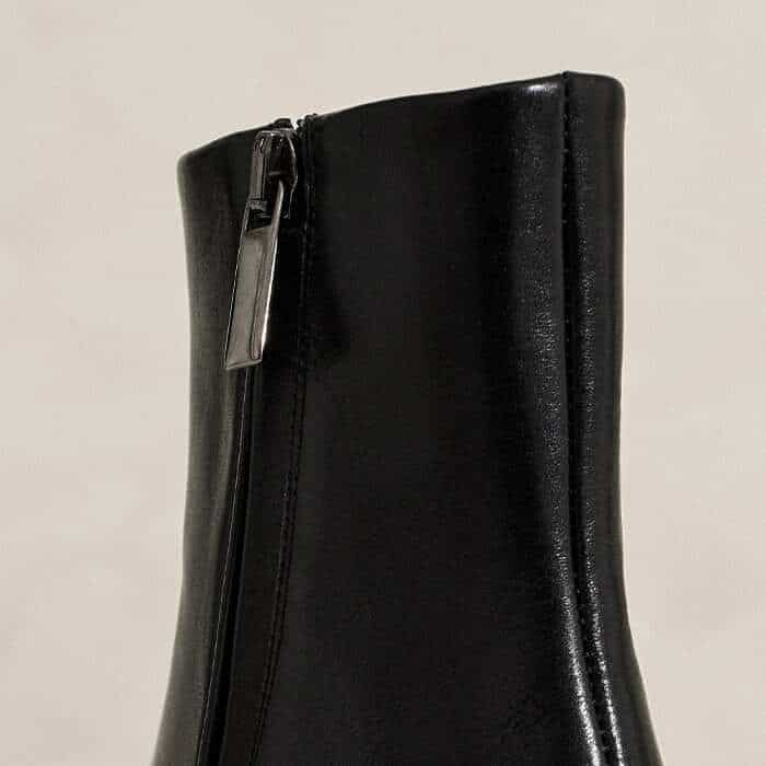 Positioned on the inside of the ankle, a zip fastening allows you to slip these on and off easily.