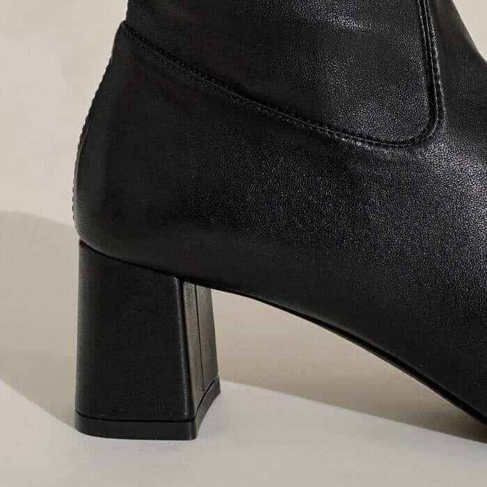 Inspired by styles from the 60s, the heel flares to a wider base.