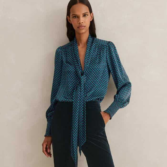 Emphasise the style's deep ink-blue hue with our Silk Digital Dot Print Side Necktie Blouse. 