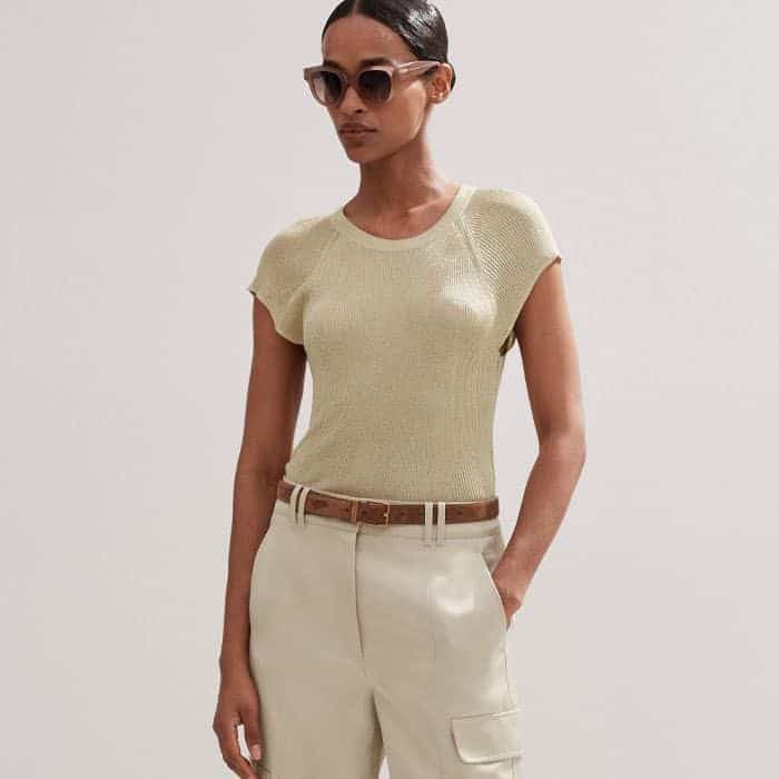 Stick to golden tones and pair it with our Metallic Rib Cap Sleeve Knit Tee.