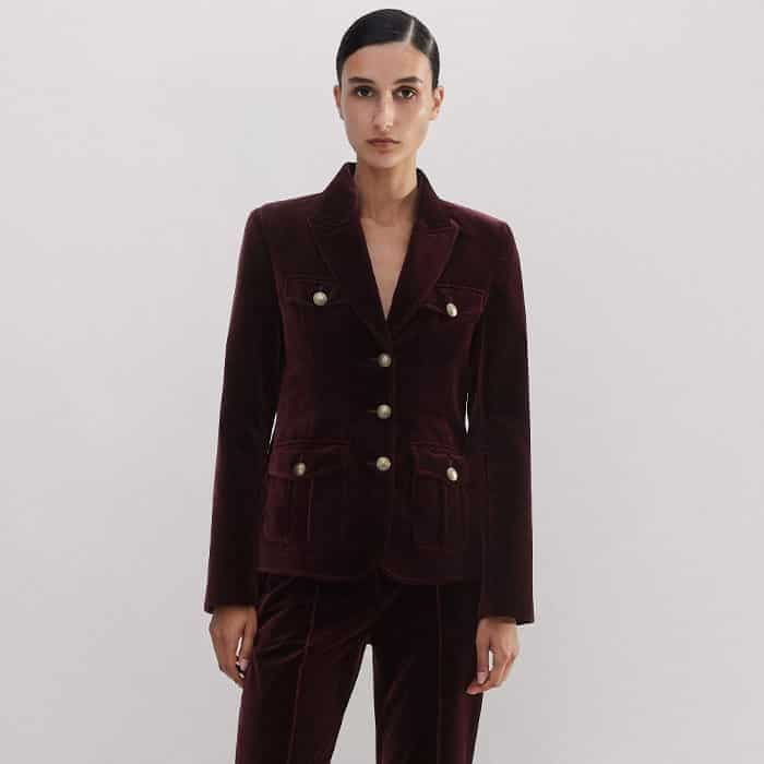 Embrace the merlot hue and tactile finish with the coordinating Velvet Evening Jacket.