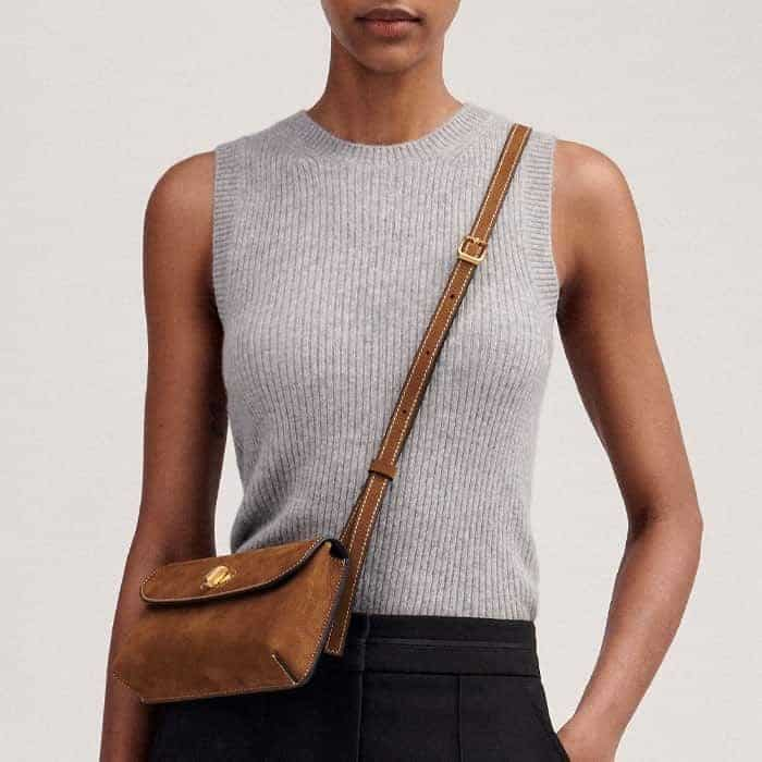 Our Cashmere Rib Vest and Small Leather Pouch build an effortlessly elevated look.