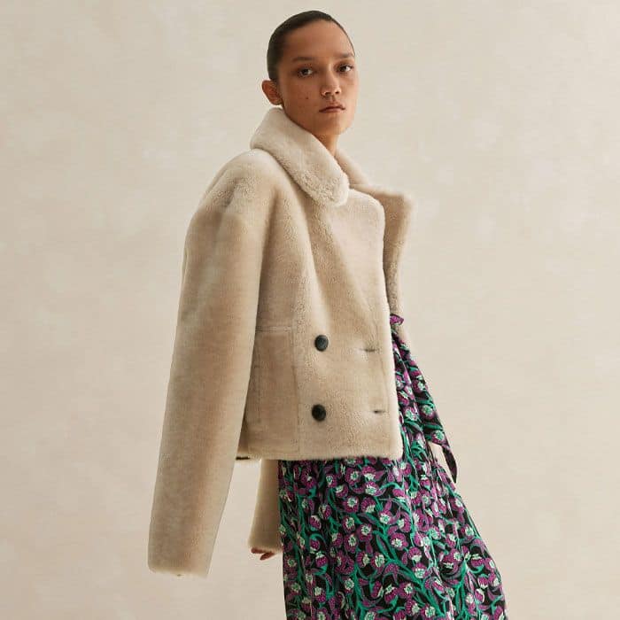 Build a look around contrasting textures and tones by styling with our Luxe Short Shearling Coat. 