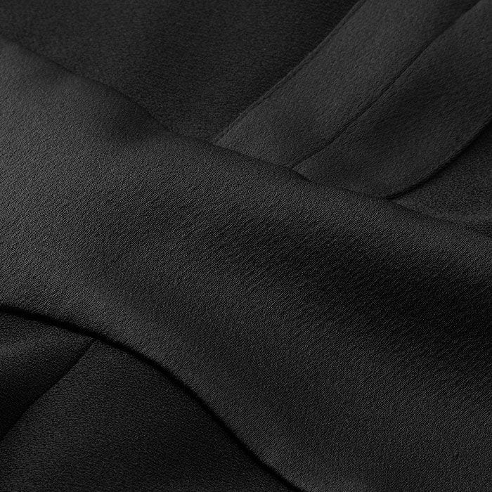 Lower-impact satin-back crepe fabric. We have used both the high shine and matte side of the fabric for contrast and depth. Crease resistant and easy care. 