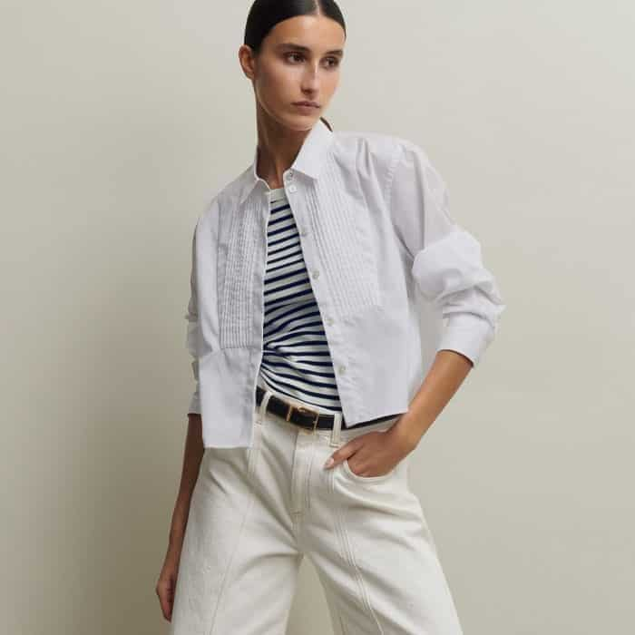 Bring out the white hue of the stripe with our Seam Front Wide-Leg Flare Jean.