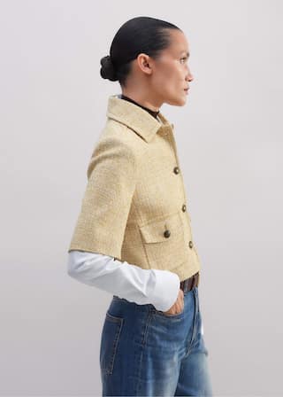 Crafted from a cotton blend Italian fabric in dual flecks to create a beautiful tweed.