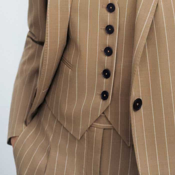 For a head-to-toe pinstripe finish, wear it with the matching Wool-Blend Pinstripe Blazer and Trouser in a wide-leg or slim-cropped silhouette.