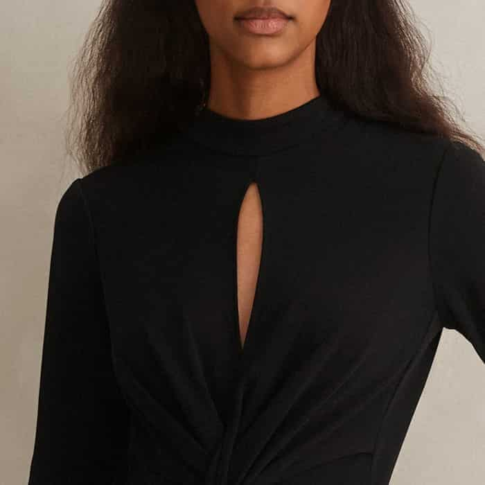 A keyhole detail at the chest adds a contemporary cut-out to the neckline.