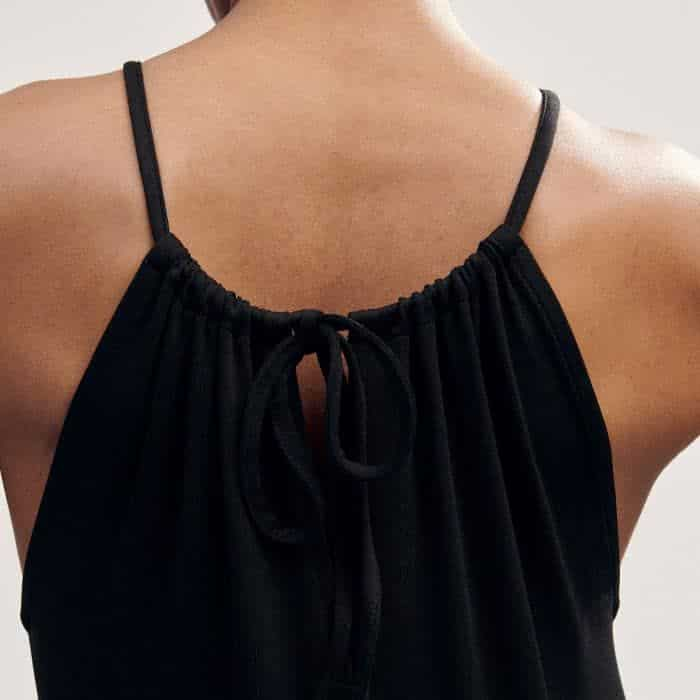 The halter neck leads to a tie detail at the back which can be adjusted. 