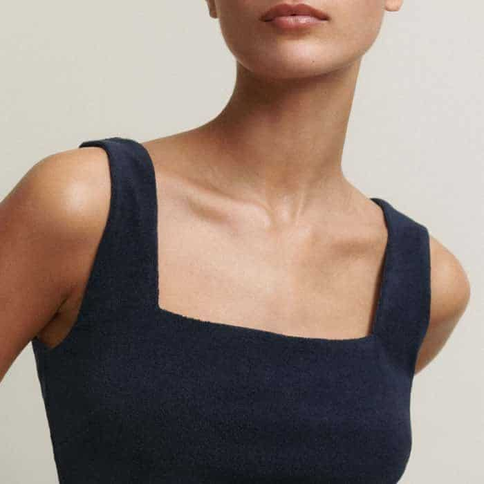 The piece features a flattering square neckline and is cut to a slim fit.