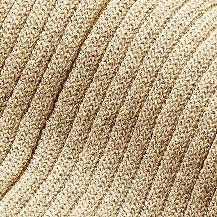 Crafted from a lightweight viscose stretch yarn knitted in a fine rib stitch with metallic fibres knitted throughout. This has a cool, soft hand feel and a lightweight drape.