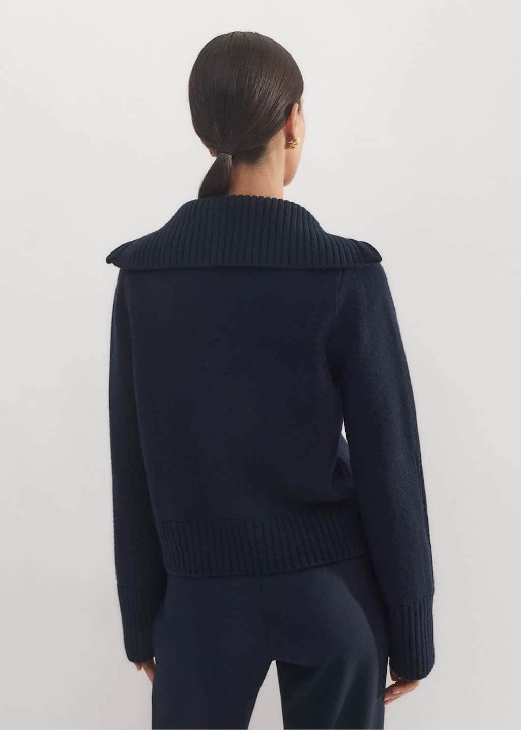 Responsibly sourced merino wool blended with supersoft cashmere, knitted in a plain jersey stitch with ribbed trims. 