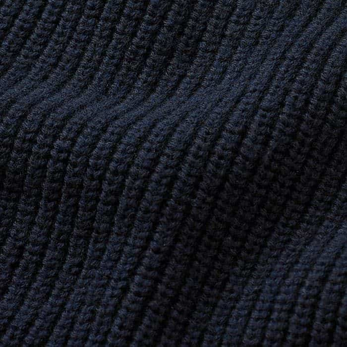 Cotton blended with responsibly sourced merino wool knitted in a chunky cardigan rib stitch, mid-heavy weight on 5gg.