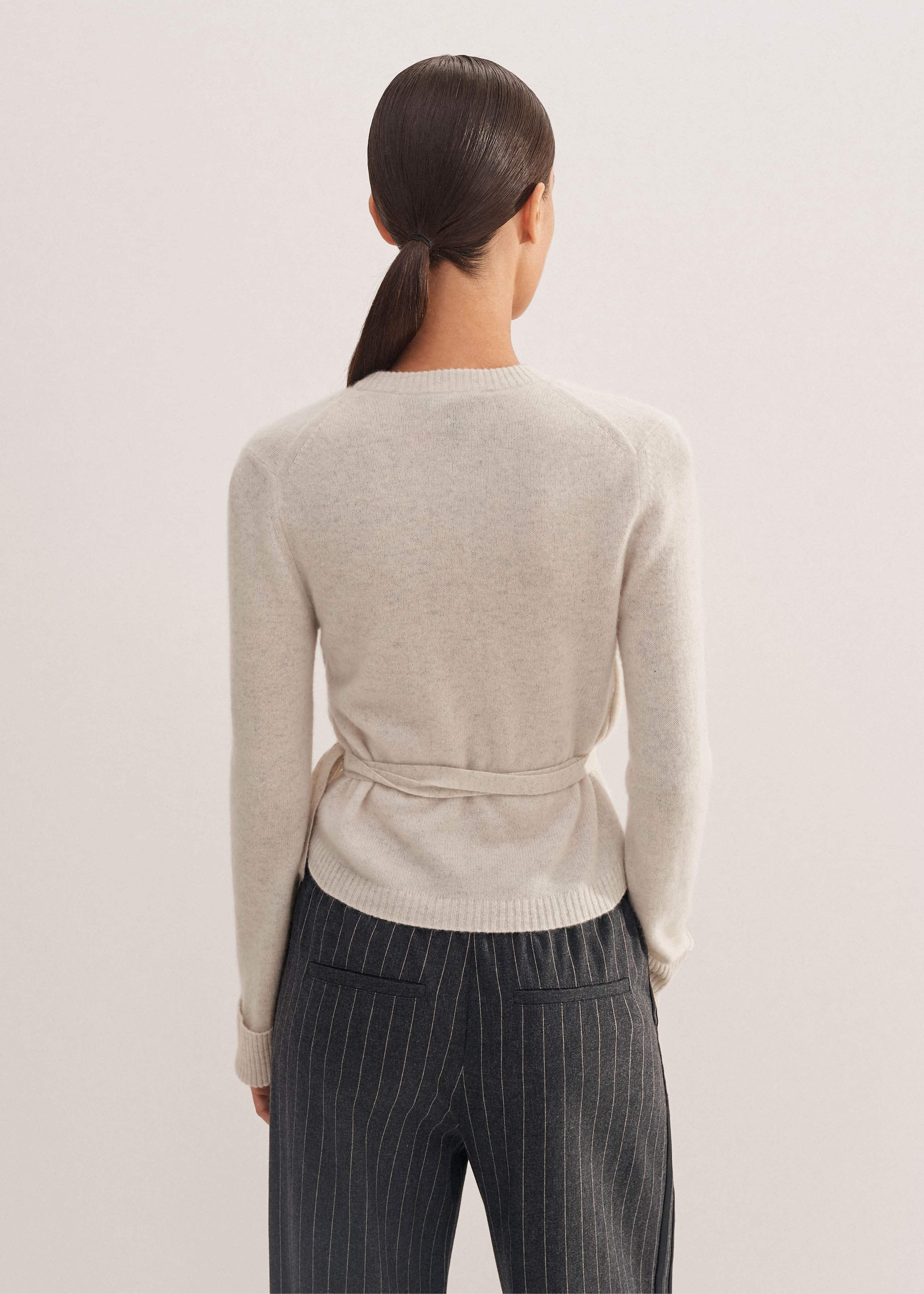 Crafted from luxurious pure cashmere. The base layer is knitted ribbed on 12gg with 7gg trims and the outer layer is knitted in a plain jersey stitch on 9gg.