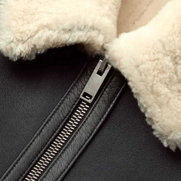 Crafted in the UK from smooth leather, outlined with shearling trims with seam detailing for structure.All our leather and shearling is by-product.