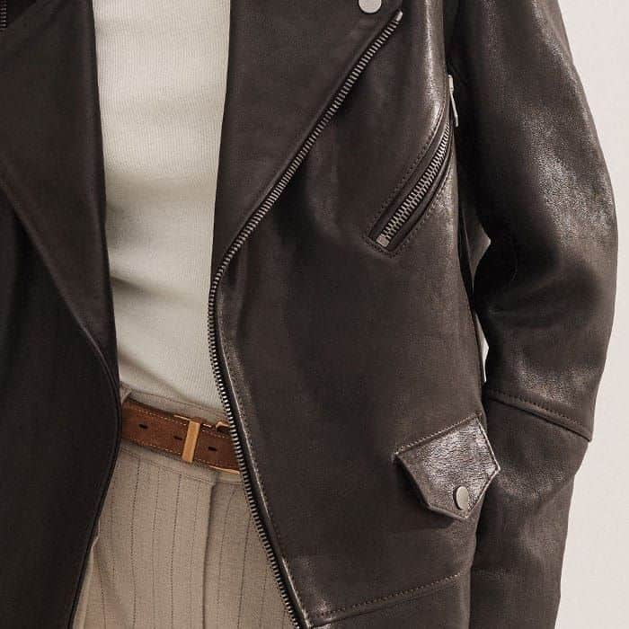 A variety of pockets with button and zip details find their way around the jacket.