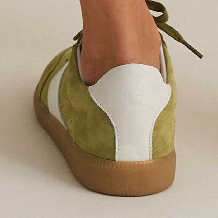 A rubber tonal sole contrasts with the green hue of the shoe, helping to conceal dirt and scuff marks.