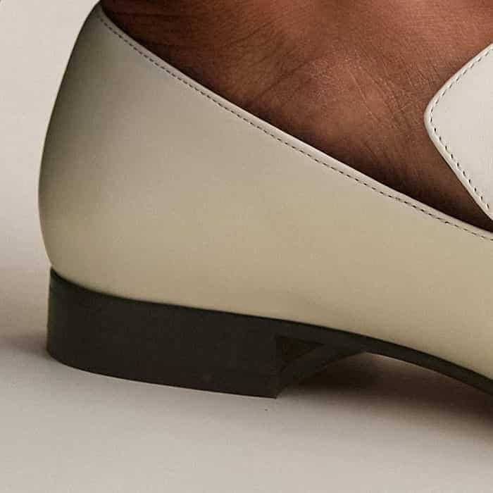 Adding comfortable height, the heel is joined by a thick sole.