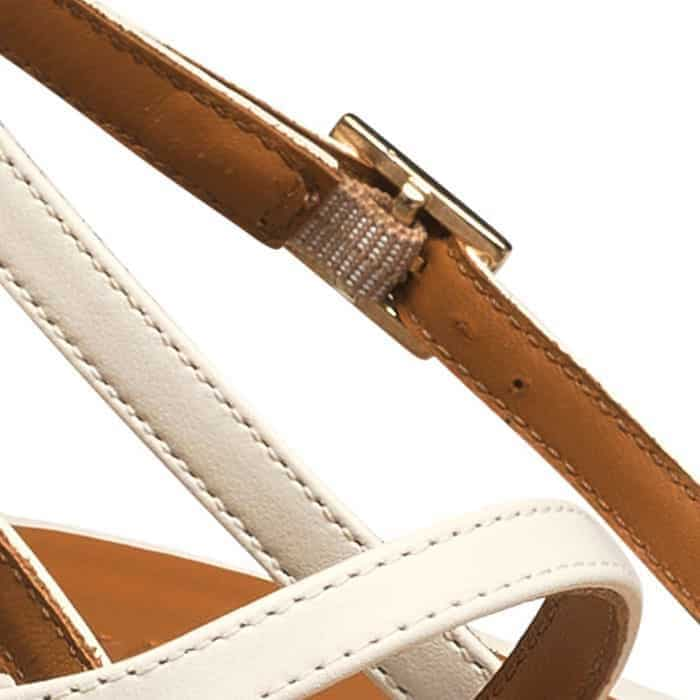 Providing extra support, three straps decorated with faux pearls make their way along the foot. 