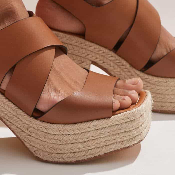 The platform and heel are covered with natural jute for a sun-soaked finish.