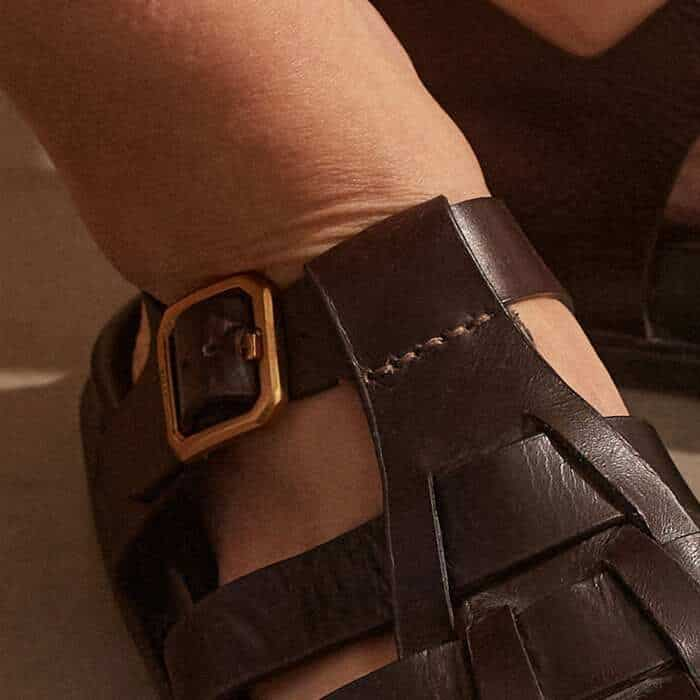 A gold-plated buckle at the ankle with bespoke ME+EM branding allows you to perfect the fit.