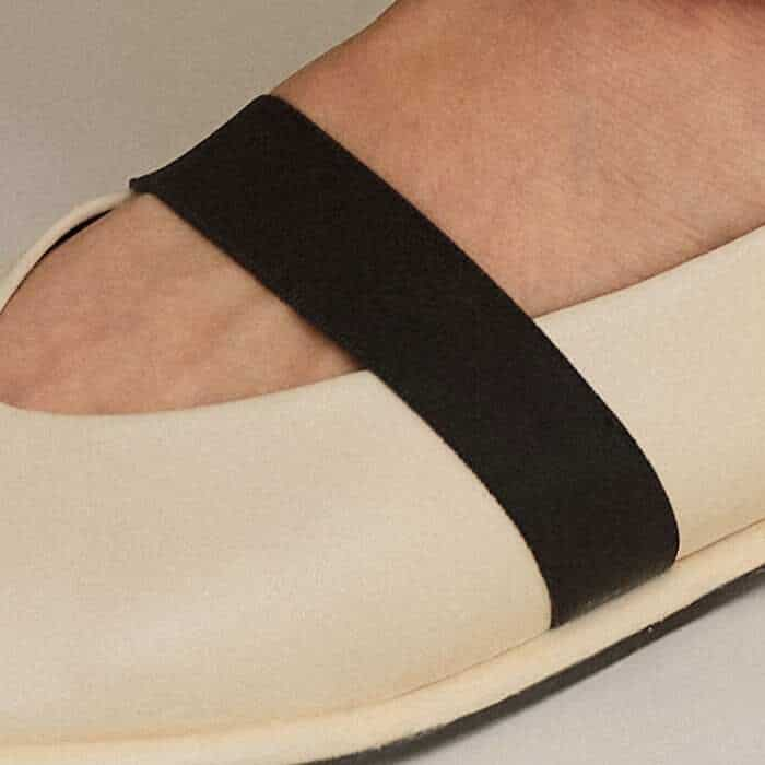 An elasticated band across the foot provides extra comfort, give and support.