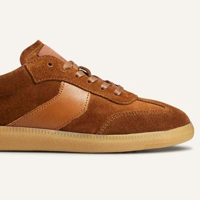 A contrasting tonal gum sole subtly conceals any marks and scuffs synonymous with everyday wear.