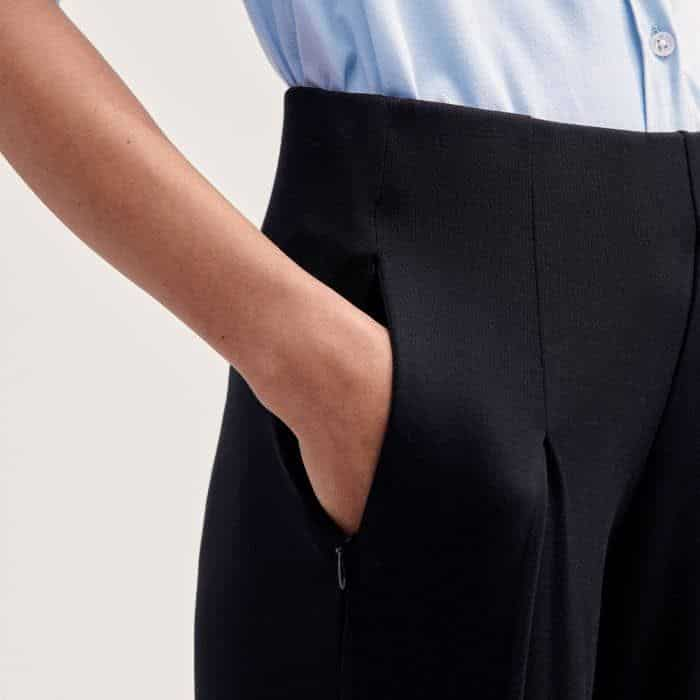 Adding functionality, pockets find a home in front of the side seams for a bulk-free finish.