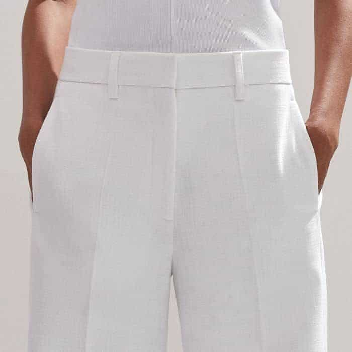 Pockets are positioned in front of the side seam to add functionality without adding bulk.