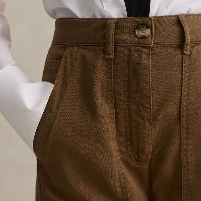 Large pockets are positioned in front of the side seams for a flattering, functional finish.