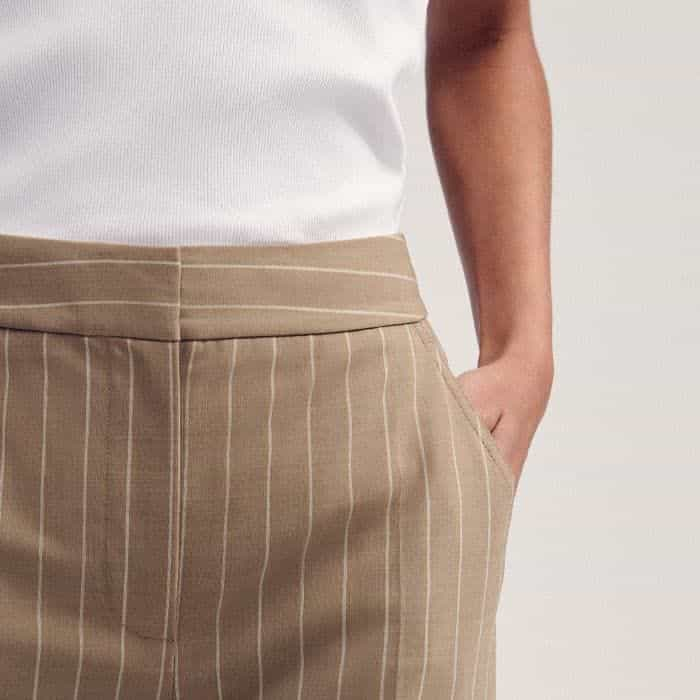 Pockets are positioned in front of the side seams for a bulk-free finish.