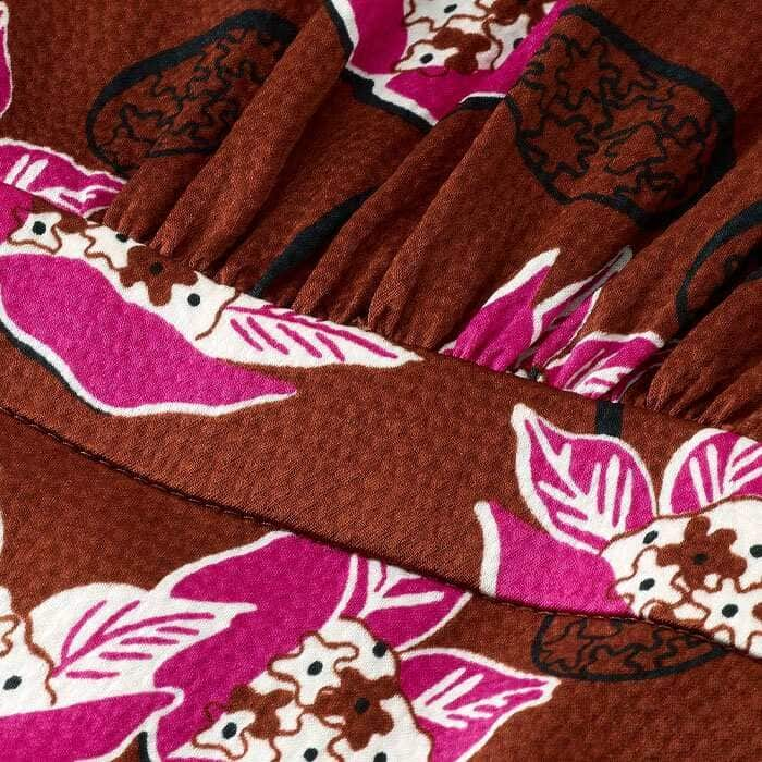 Texture satin fabric features our bespoke Waterlily print, combining pecan and pink hues.