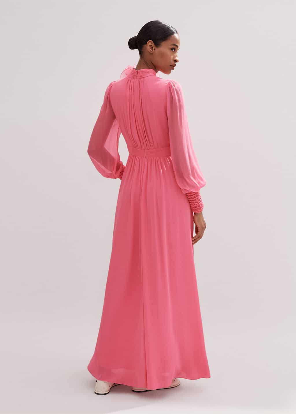 Luxurious silk lined with lightweight, breathable viscose georgette to minimise transparency, boasting our statement Perfect Pink hue.