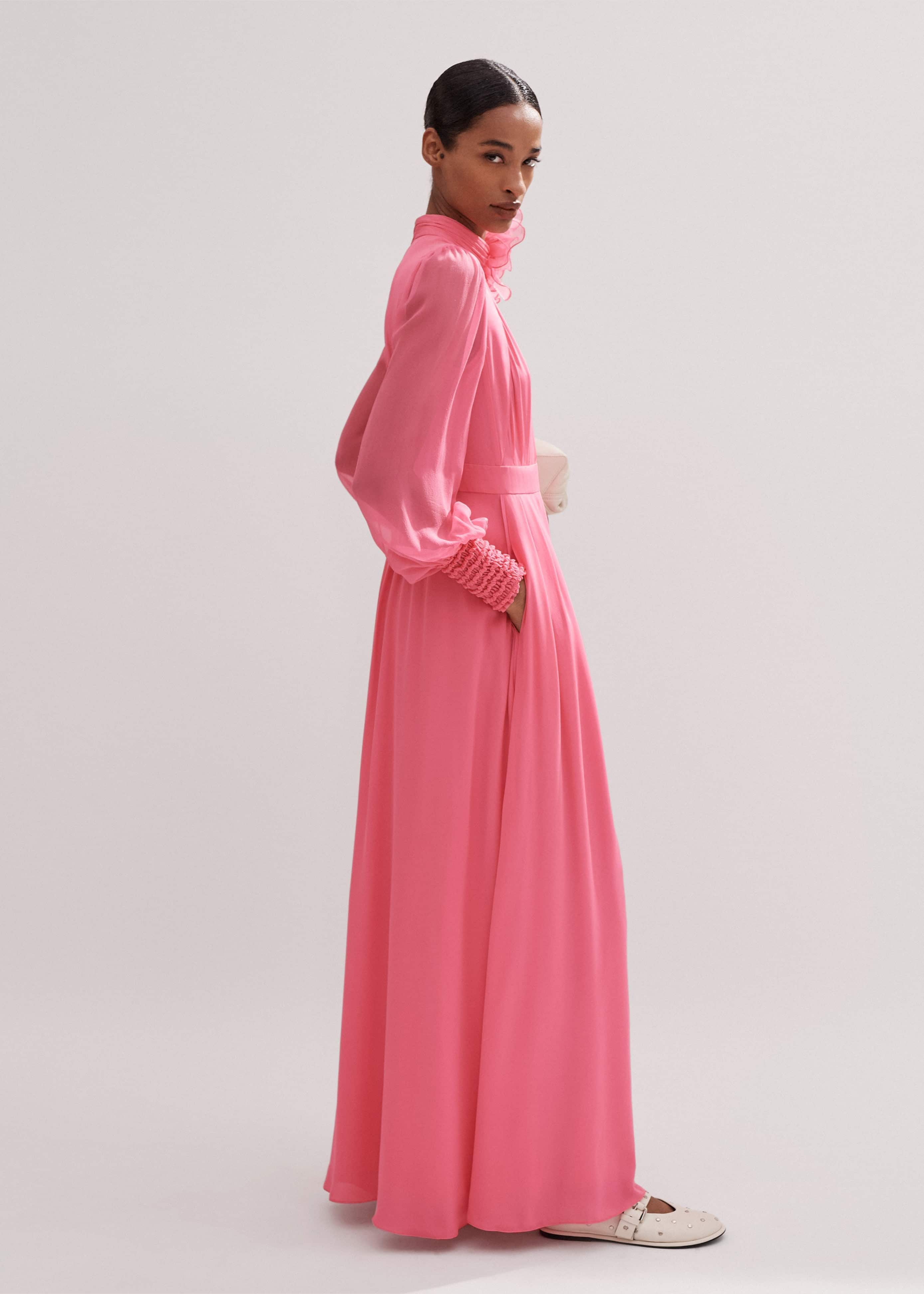 Luxurious silk lined with lightweight, breathable viscose georgette to minimise transparency, boasting our statement Perfect Pink hue.