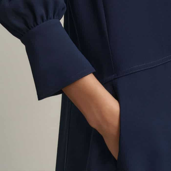 The pockets are subtly positioned in front of the side seams for a bulk-free finish.