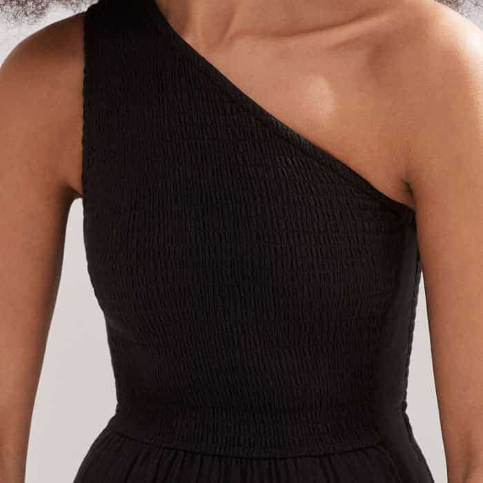 The shirred bodice is non-restrictive for a flattering, comfortable fit.