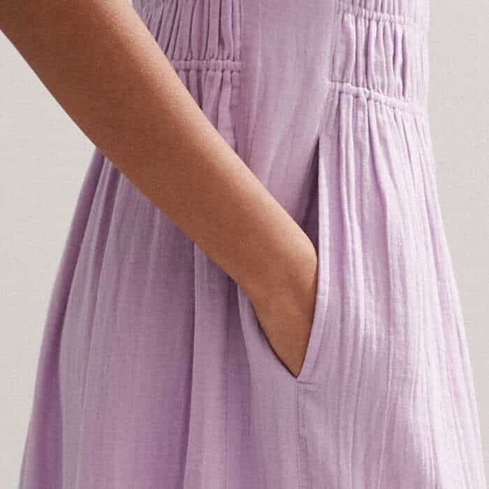 Pockets are flatteringly placed in front of the side seams for a bulk-free finish.