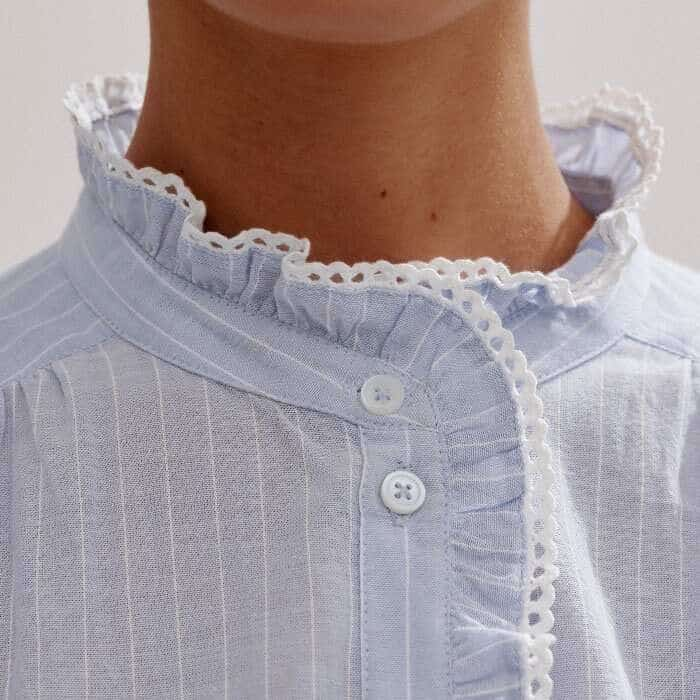 The button-down front can be left undone to accommodate different bust sizes. 