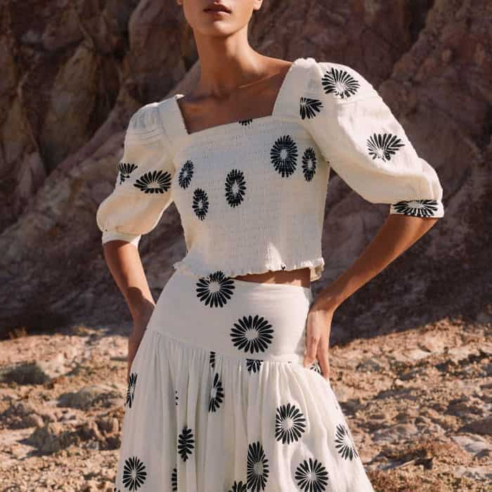 Wear with the matching Cheesecloth Modern Daisy Print Maxi Skirt to build a coordinated look.