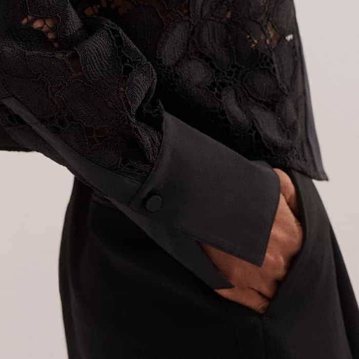 The long lace sleeves fall to deep cuffs crafted from contrasting cotton sateen for a flattering texture contrast.