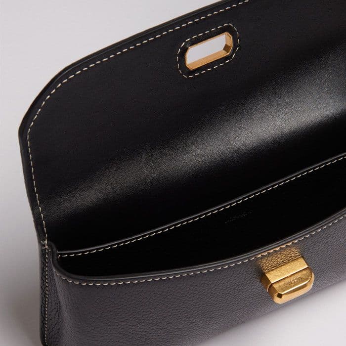 The internal slip pocket is useful for storing small valuables.