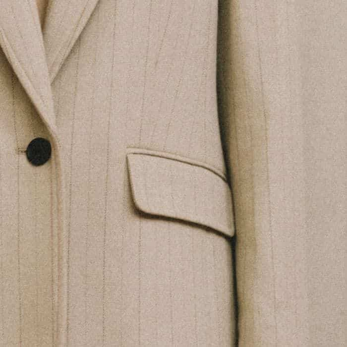 The slanted chest pocket and front flap pockets nod to traditional tailoring codes. 