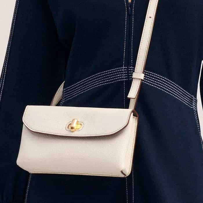 Our Small Leather Pouch colour matches the soft white contrast stitch detailing.