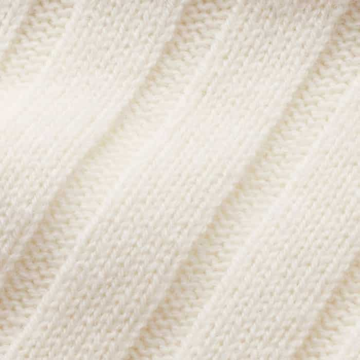 Responsible Wool Standard certified merino wool blended with supersoft cashmere, knitted in a wide rib stitch with ribbed trims on midweight 7gg yarn. 