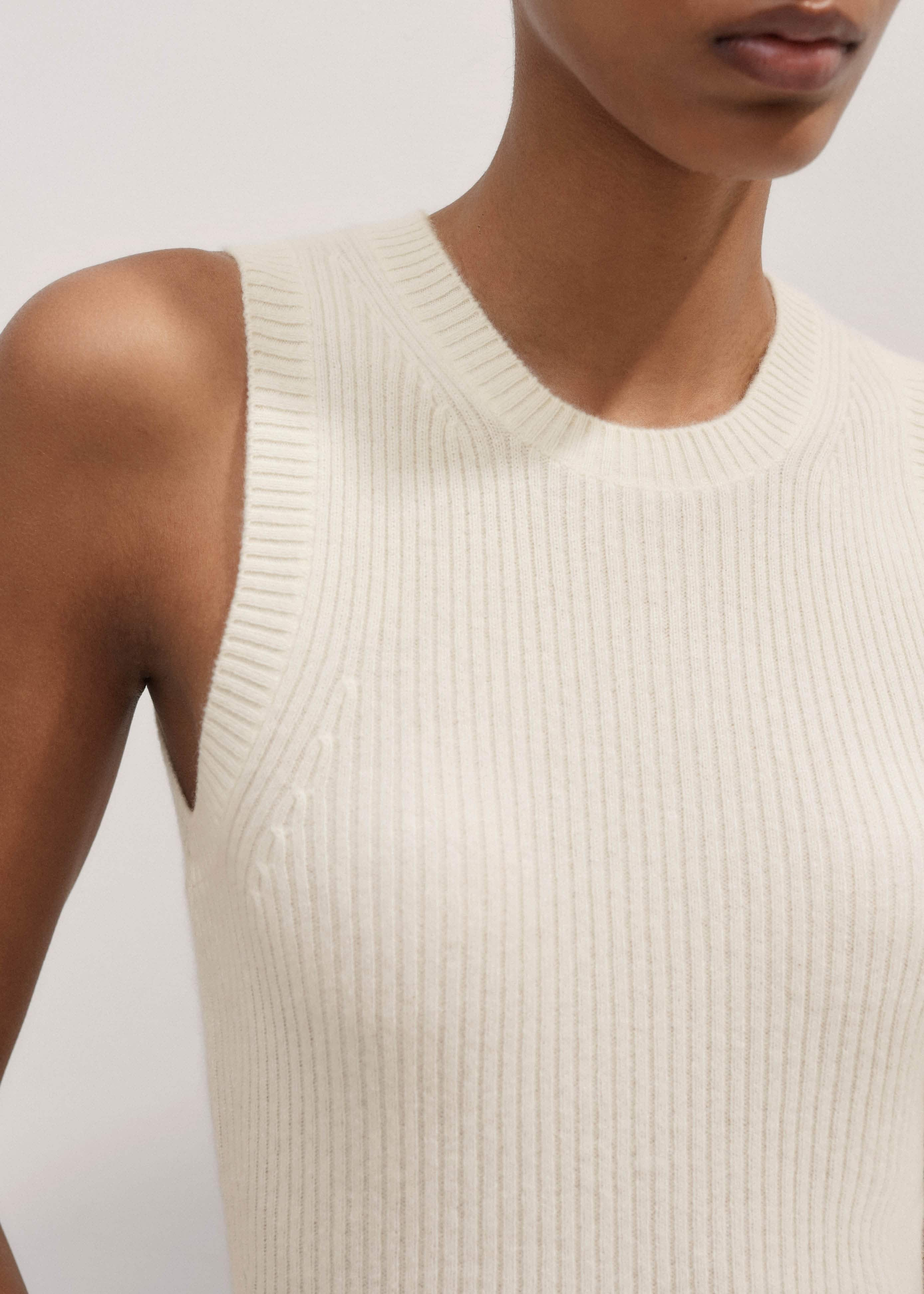 Crafted from luxurious pure cashmere, knitted lightweight in a fine rib stitch, with an incredibly soft hand feel.